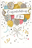 This image shows a refined yet joyful congratulations card, the kind a Lower Clapton florist might place beside a display of fresh bouquets for celebrating life's proudest moments. Central to the design is a grouping of balloons, drawn as though they form a single, airy bouquet reaching upward. They are coloured in softly glowing hues of gold, silver, champagne, pale blue, muted pink and gentle grey, with each balloon bearing its own decoration: slender metallic stripes, scattered star motifs or a dusting of fine glitter. The overlapping arrangement creates a sense of depth and quiet movement, like balloons gently swaying above a garden gathering near Clapton Pond. From their bases, trailing ribbons in shimmering gold and silver flow downward in relaxed curls, visually tying the elements of the composition together. Across the middle, a curved banner stretches gracefully, tinted in a light cream and displaying the message Congratulations To You in elegant, sweeping calligraphy that communicates genuine pride and warmth. The surrounding background is alive with tiny metallic stars, dots and ribbon-like swirls, suggesting confetti drifting through the air after applause has faded. The card's printed details appear subtly embossed, with points of sparkle that would catch both light and touch, evoking the same sense of craftsmanship found in a carefully arranged vase of flowers. Overall, the mood is celebratory without being loud-perfectly suited to acknowledging exam success, new jobs, promotions or any personal achievement, especially when paired with a hand-tied bouquet from Flowers Lower Clapton for delivery throughout the local neighbourhood.